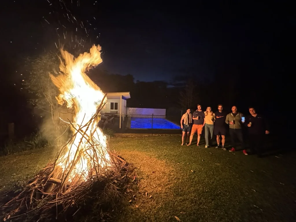 Evening bonfire gathering with members