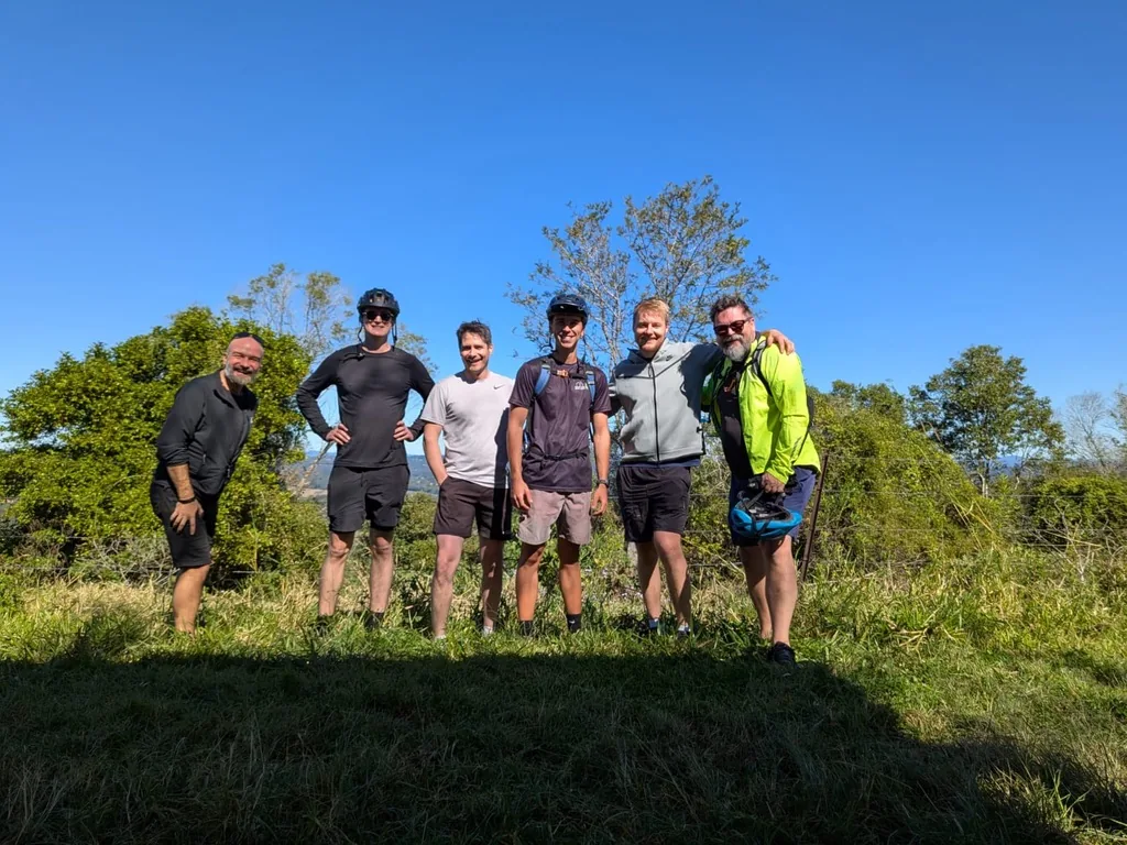 Members on a mountain bike ride between sessions