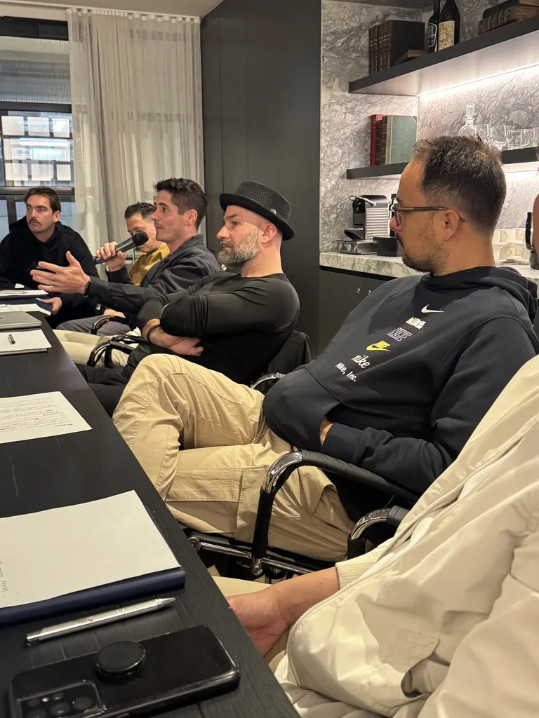 Attendees listening intently during a member-led session